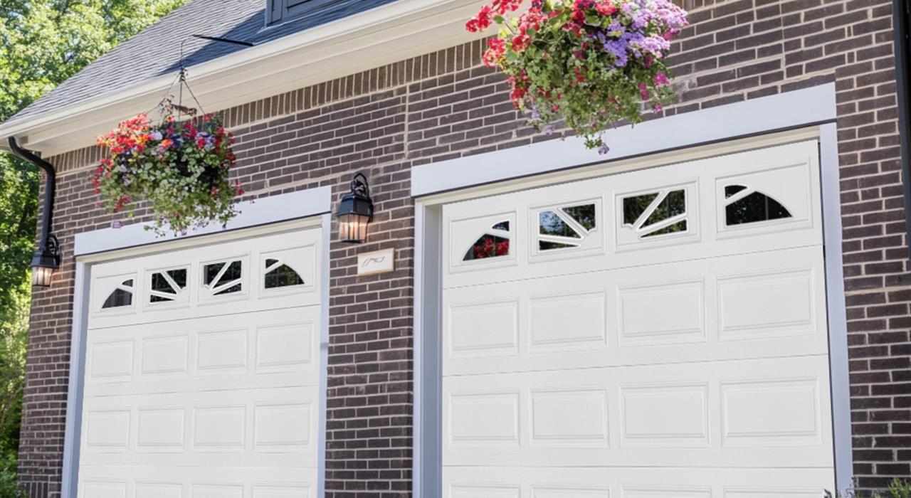 White garage doors with decorative window inserts